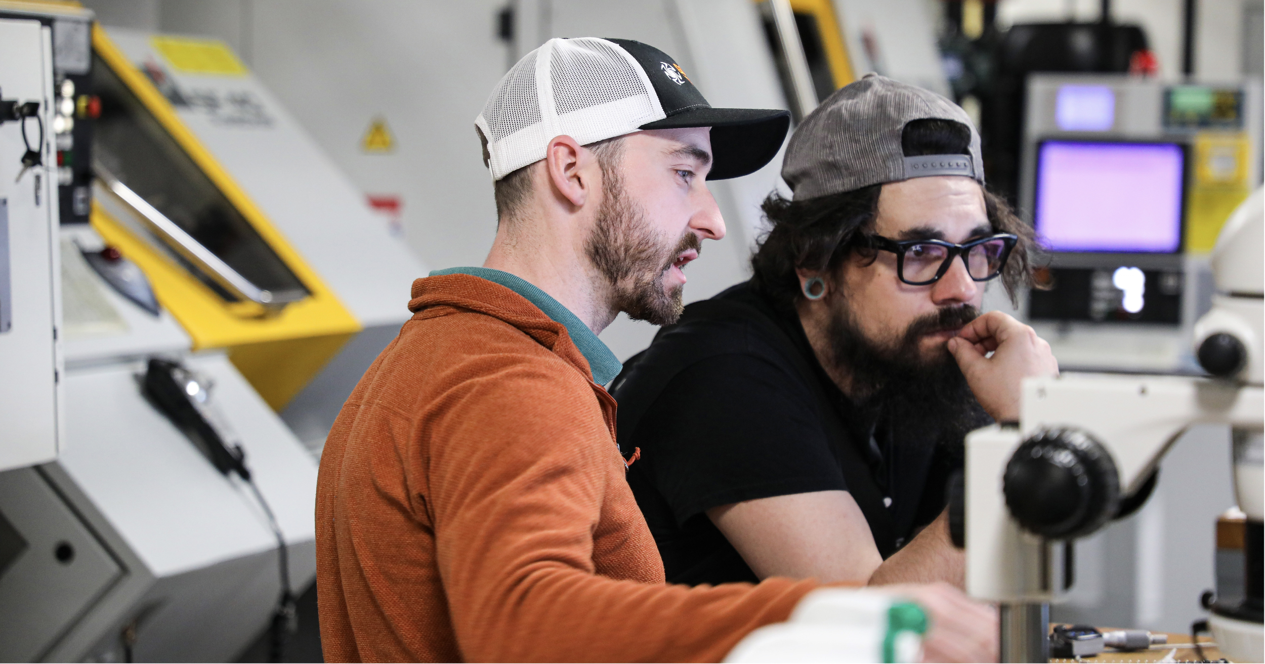 A Sonic Tools Engineer and Machinist reviewing custom carbide end mill specifications together at the Sonic Tools machine shop in Ashland, Virginia