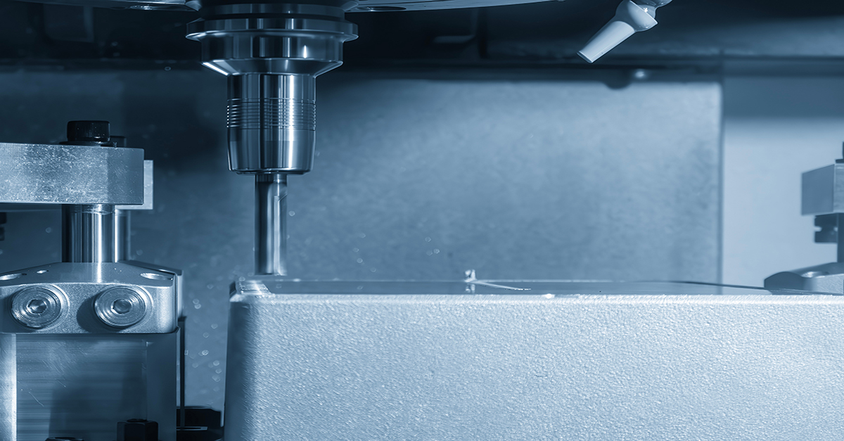 High speed aluminum cutter making finishing passes on an aluminum workpiece using a CNC machine